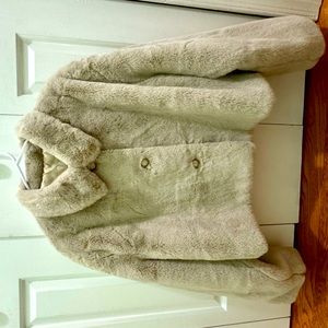 Women Faux fur, Size Xl made in China. fashion , fluffy short coat.